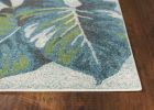 5' X 8' Beige Teal and Green Tropical Botanical Leaves Area Rug