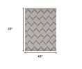 2' X 4' Green and Ivory Geometric Indoor Outdoor Area Rug