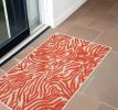 3' X 4' Red And Ivory Abstract Indoor Outdoor Area Rug