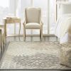 5' X 8' Gray and Ivory Indoor Outdoor Area Rug