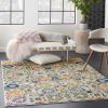 5' X 7' Orange And Ivory Floral Power Loom Area Rug