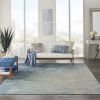 8' X 10' Ivory And Blue Abstract Power Loom Area Rug