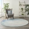 8' Ivory And Blue Round Abstract Power Loom Area Rug