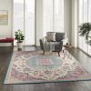 7' X 10' Pink And Green Dhurrie Area Rug