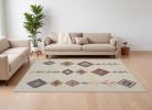 7' X 10' Ivory Geometric Berber Area Rug