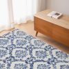 4' X 6' Blue And Ivory Floral Dhurrie Area Rug